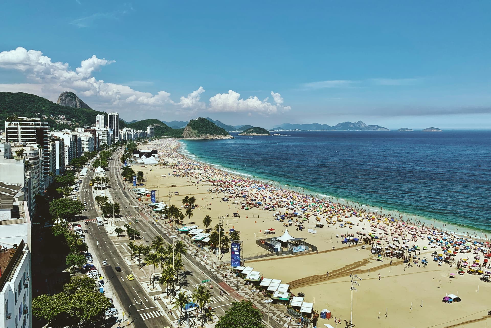 Copacabana Beach in Rio de Janeiro with people and iconic wave pattern