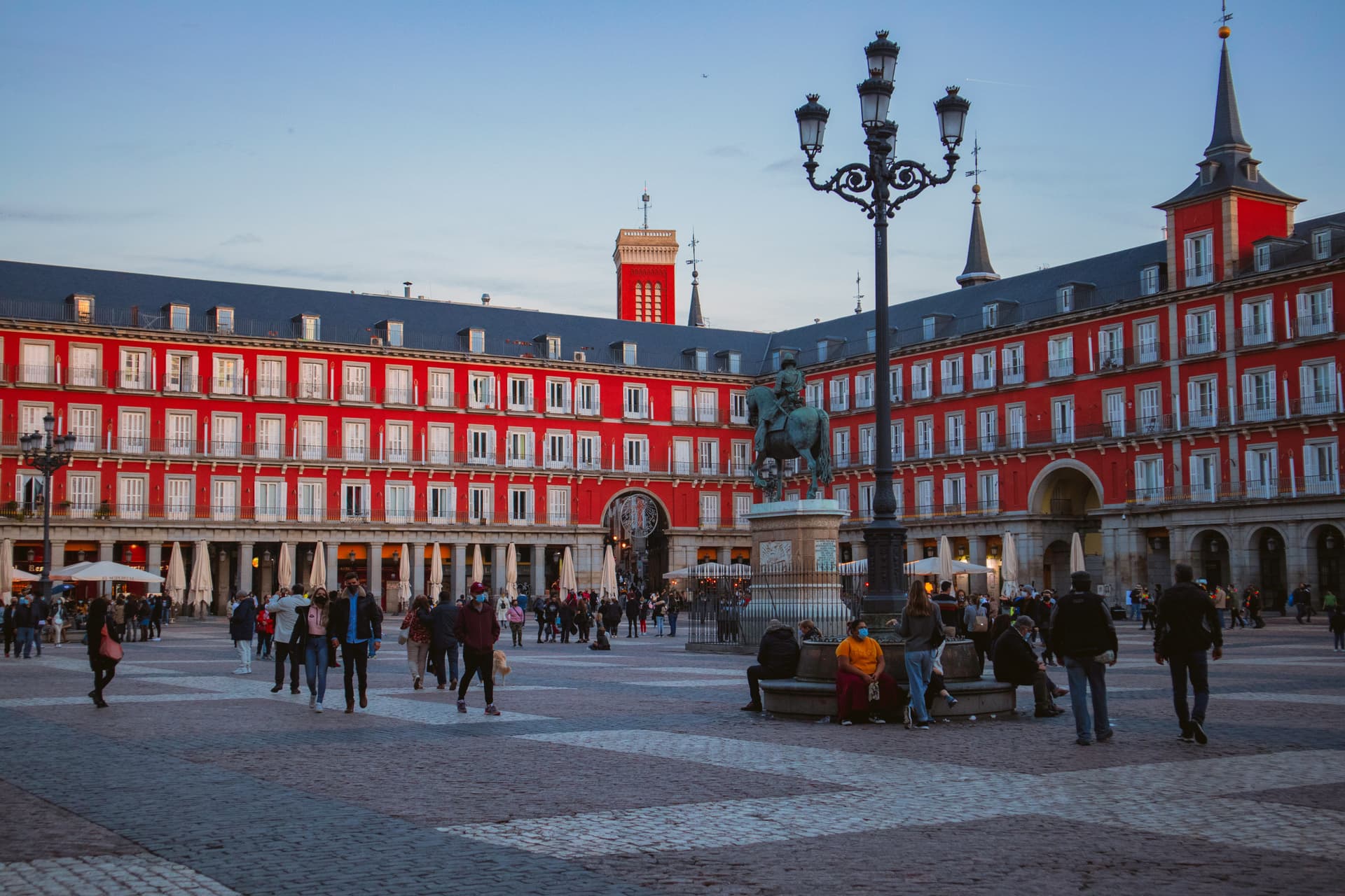 Plaza Mayor in Madrid with cafes and tourists