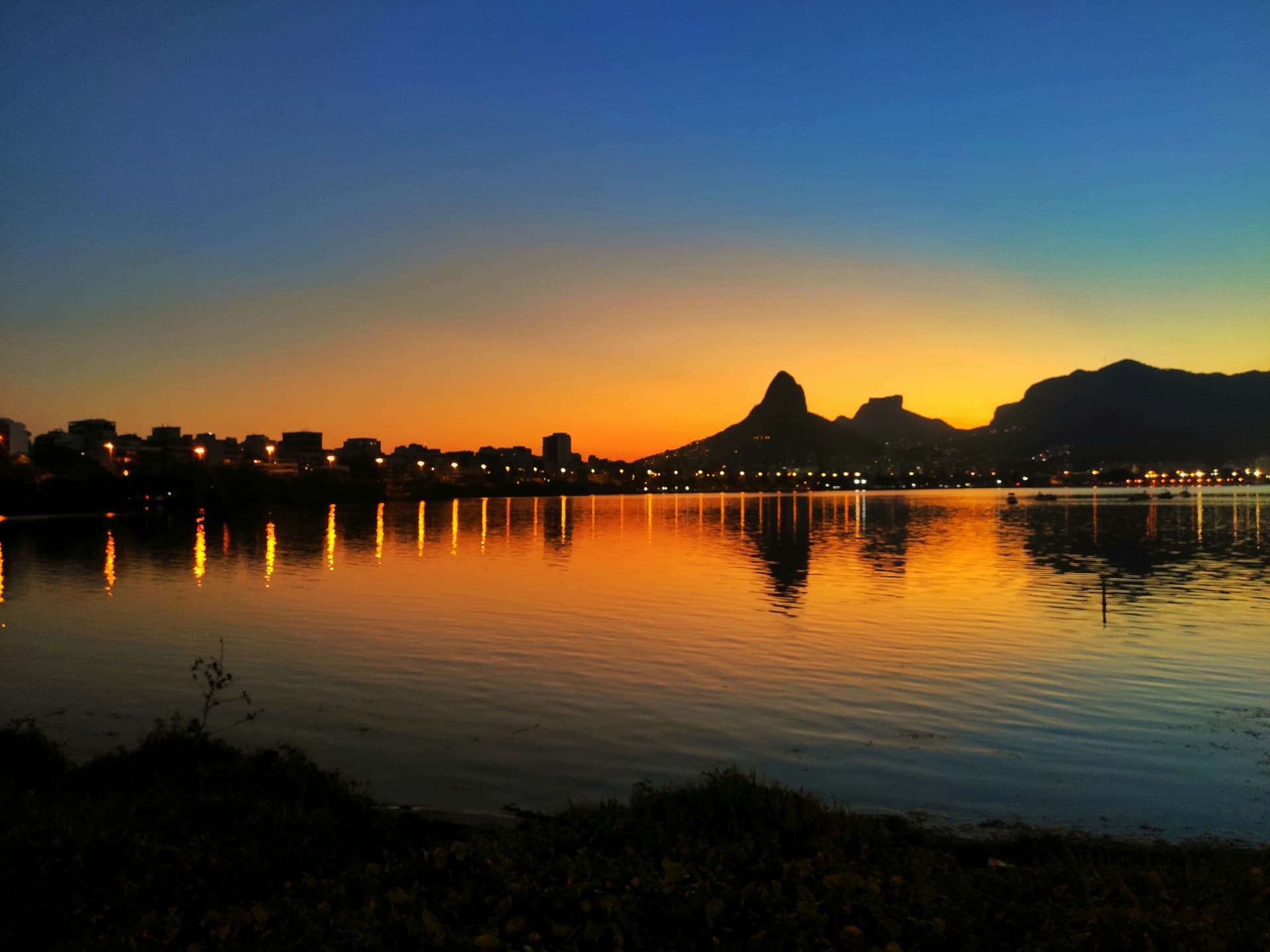 Sunset over Rio de Janeiro with reflection on water
